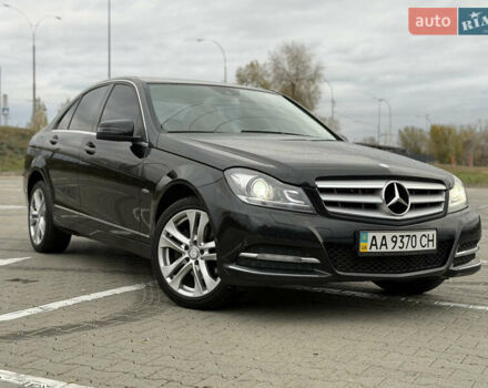 Черный Мерседес Ц-Класс, объемом двигателя 1.8 л и пробегом 147 тыс. км за 11950 $, фото 1 на Automoto.ua