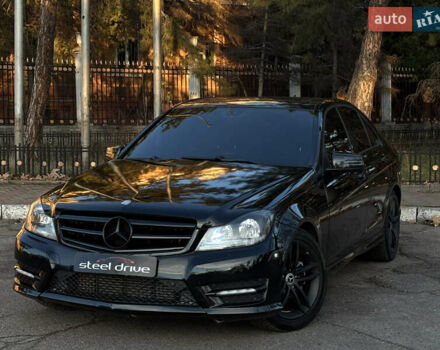 Черный Мерседес Ц-Класс, объемом двигателя 1.8 л и пробегом 176 тыс. км за 11999 $, фото 1 на Automoto.ua