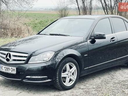 Черный Мерседес Ц-Класс, объемом двигателя 1.8 л и пробегом 202 тыс. км за 13500 $, фото 1 на Automoto.ua