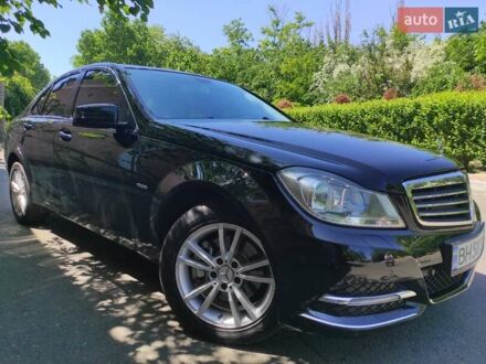 Черный Мерседес Ц-Класс, объемом двигателя 1.8 л и пробегом 143 тыс. км за 11000 $, фото 1 на Automoto.ua