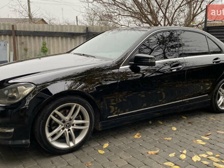 Черный Мерседес Ц-Класс, объемом двигателя 1.8 л и пробегом 270 тыс. км за 11700 $, фото 1 на Automoto.ua