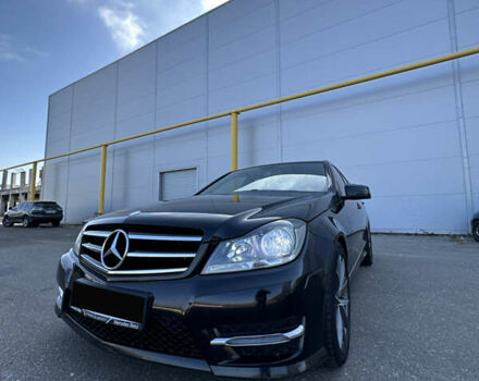 Черный Мерседес Ц-Класс, объемом двигателя 1.8 л и пробегом 230 тыс. км за 13500 $, фото 1 на Automoto.ua