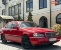Красный Мерседес Ц-Класс, объемом двигателя 1.8 л и пробегом 299 тыс. км за 2499 $, фото 1 на Automoto.ua