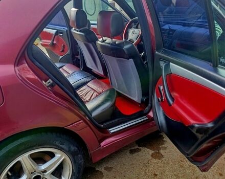 Красный Мерседес Ц-Класс, объемом двигателя 1.8 л и пробегом 426 тыс. км за 2850 $, фото 10 на Automoto.ua