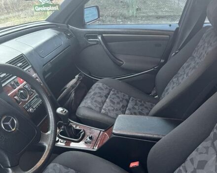 Красный Мерседес Ц-Класс, объемом двигателя 1.8 л и пробегом 187 тыс. км за 4500 $, фото 5 на Automoto.ua