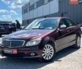 Красный Мерседес Ц-Класс, объемом двигателя 1.8 л и пробегом 327 тыс. км за 8290 $, фото 1 на Automoto.ua