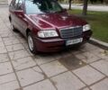 Красный Мерседес Ц-Класс, объемом двигателя 1.8 л и пробегом 342 тыс. км за 3700 $, фото 1 на Automoto.ua