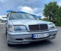 Сірий Мерседес Ц-Клас, об'ємом двигуна 2 л та пробігом 250 тис. км за 2550 $, фото 5 на Automoto.ua