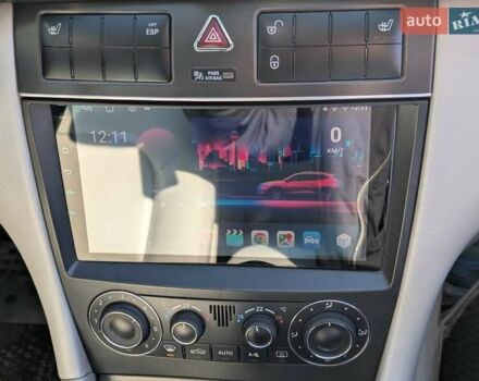 Мерседес Ц-Класс 2005 в Ровно на Automoto.ua Синий Мерседес Ц-Класс, объемом двигателя 2.1 л и пробегом 305 тыс. км за 6450 $, фото 33 на Automoto.ua