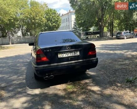 Синий Мерседес Ц-Класс, объемом двигателя 1.8 л и пробегом 300 тыс. км за 2800 $, фото 3 на Automoto.ua