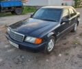 Синій Мерседес Ц-Клас, об'ємом двигуна 2 л та пробігом 270 тис. км за 1200 $, фото 1 на Automoto.ua