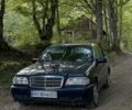 Синій Мерседес Ц-Клас, об'ємом двигуна 2 л та пробігом 394 тис. км за 2100 $, фото 1 на Automoto.ua