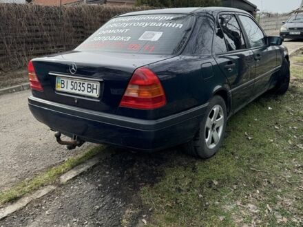Мерседес Ц-Клас 1994 у Кривому Розі на Automoto.ua Синій Мерседес Ц-Клас, об'ємом двигуна 1.8 л та пробігом 240 тис. км за 2100 $, фото 1 на Automoto.ua