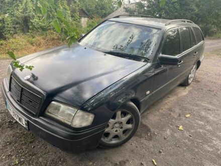 Синий Мерседес Ц-Класс, объемом двигателя 1.8 л и пробегом 270 тыс. км за 600 $, фото 1 на Automoto.ua