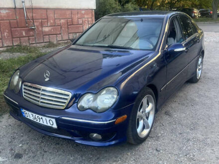 Синий Мерседес Ц-Класс, объемом двигателя 1.8 л и пробегом 211 тыс. км за 5450 $, фото 1 на Automoto.ua