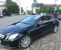 Чорний Мерседес E 200, об'ємом двигуна 1.8 л та пробігом 145 тис. км за 23100 $, фото 1 на Automoto.ua