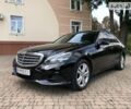 Чорний Мерседес E 200, об'ємом двигуна 2 л та пробігом 150 тис. км за 22999 $, фото 1 на Automoto.ua