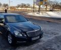 Черный Мерседес E 220, объемом двигателя 1.8 л и пробегом 170 тыс. км за 18000 $, фото 1 на Automoto.ua