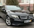 Чорний Мерседес E 220, об'ємом двигуна 2 л та пробігом 164 тис. км за 32899 $, фото 1 на Automoto.ua