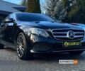 Чорний Мерседес E 220, об'ємом двигуна 2 л та пробігом 296 тис. км за 27999 $, фото 1 на Automoto.ua