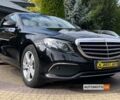 Черный Мерседес E 220, объемом двигателя 2 л и пробегом 179 тыс. км за 30999 $, фото 1 на Automoto.ua