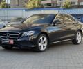 Черный Мерседес E 220, объемом двигателя 2 л и пробегом 81 тыс. км за 31990 $, фото 1 на Automoto.ua