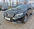 Чорний Мерседес E 220, об'ємом двигуна 2.1 л та пробігом 162 тис. км за 18500 $, фото 1 на Automoto.ua