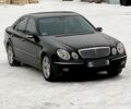 Чорний Мерседес E 220, об'ємом двигуна 2.2 л та пробігом 210 тис. км за 10700 $, фото 1 на Automoto.ua