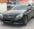 Чорний Мерседес E 220, об'ємом двигуна 2.2 л та пробігом 75 тис. км за 27800 $, фото 1 на Automoto.ua