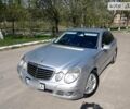 Сірий Мерседес E 220, об'ємом двигуна 2.2 л та пробігом 218 тис. км за 13300 $, фото 1 на Automoto.ua