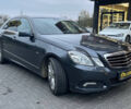 Сірий Мерседес E 250, об'ємом двигуна 2.2 л та пробігом 205 тис. км за 12600 $, фото 1 на Automoto.ua