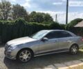 Сірий Мерседес E 250, об'ємом двигуна 2.2 л та пробігом 290 тис. км за 18750 $, фото 1 на Automoto.ua