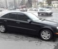 Чорний Мерседес Е 320, об'ємом двигуна 3.2 л та пробігом 240 тис. км за 7990 $, фото 1 на Automoto.ua