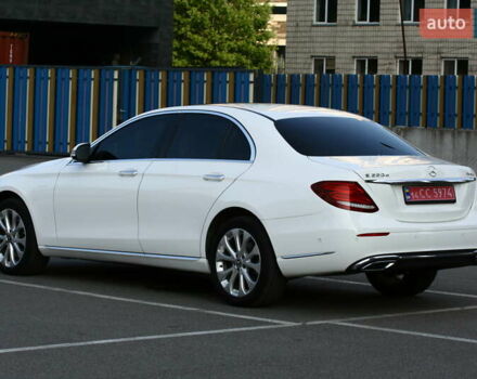 Білий Мерседес Е-Клас, об'ємом двигуна 1.95 л та пробігом 105 тис. км за 31400 $, фото 2 на Automoto.ua