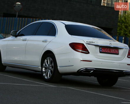 Білий Мерседес Е-Клас, об'ємом двигуна 1.95 л та пробігом 105 тис. км за 31400 $, фото 4 на Automoto.ua