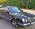 Черный Мерседес Е-Класс, объемом двигателя 2 л и пробегом 312 тыс. км за 4900 $, фото 1 на Automoto.ua