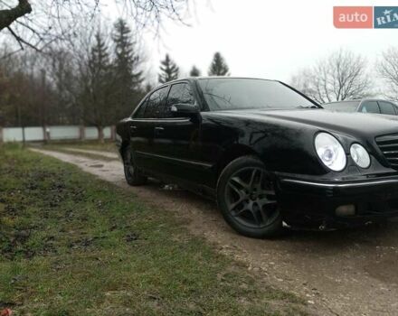 Черный Мерседес Е-Класс, объемом двигателя 2 л и пробегом 280 тыс. км за 2899 $, фото 1 на Automoto.ua