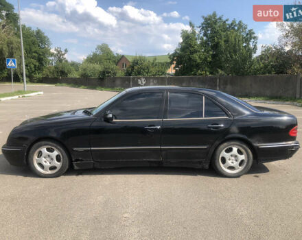 Черный Мерседес Е-Класс, объемом двигателя 2.8 л и пробегом 256 тыс. км за 2999 $, фото 1 на Automoto.ua