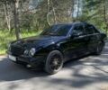 Чорний Мерседес Е-Клас, об'ємом двигуна 2 л та пробігом 300 тис. км за 5479 $, фото 1 на Automoto.ua