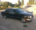 Чорний Мерседес Е-Клас, об'ємом двигуна 2 л та пробігом 300 тис. км за 5500 $, фото 1 на Automoto.ua
