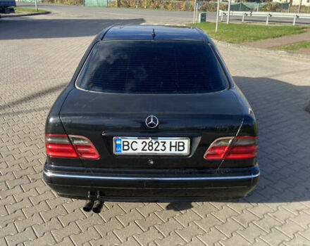 Чорний Мерседес Е-Клас, об'ємом двигуна 2 л та пробігом 100 тис. км за 3100 $, фото 19 на Automoto.ua