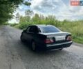 Черный Мерседес Е-Класс, объемом двигателя 2.2 л и пробегом 400 тыс. км за 2100 $, фото 4 на Automoto.ua