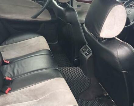 Черный Мерседес Е-Класс, объемом двигателя 2 л и пробегом 221 тыс. км за 3600 $, фото 4 на Automoto.ua