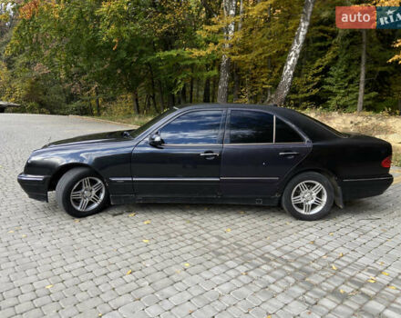 Чорний Мерседес Е-Клас, об'ємом двигуна 2 л та пробігом 100 тис. км за 3100 $, фото 3 на Automoto.ua
