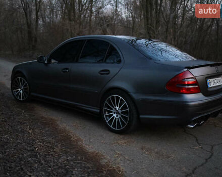 Чорний Мерседес Е-Клас, об'ємом двигуна 5 л та пробігом 320 тис. км за 12000 $, фото 3 на Automoto.ua