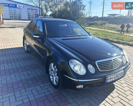 Чорний Мерседес Е-Клас, об'ємом двигуна 3.2 л та пробігом 170 тис. км за 8500 $, фото 1 на Automoto.ua