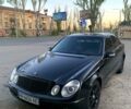Черный Мерседес Е-Класс, объемом двигателя 2.1 л и пробегом 395 тыс. км за 5600 $, фото 1 на Automoto.ua