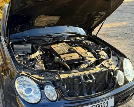 Черный Мерседес Е-Класс, объемом двигателя 1.8 л и пробегом 250 тыс. км за 5999 $, фото 11 на Automoto.ua