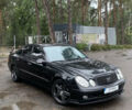 Чорний Мерседес Е-Клас, об'ємом двигуна 4.97 л та пробігом 351 тис. км за 9000 $, фото 1 на Automoto.ua