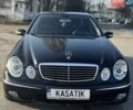 Черный Мерседес Е-Класс, объемом двигателя 3.2 л и пробегом 356 тыс. км за 7898 $, фото 1 на Automoto.ua